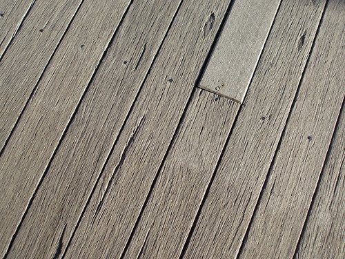 Close-up of weathered wooden deck boards